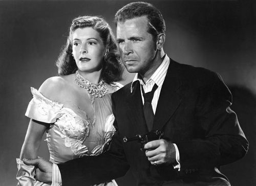 Micheline Cheirel and Dick Powell in CORNERED (1945)